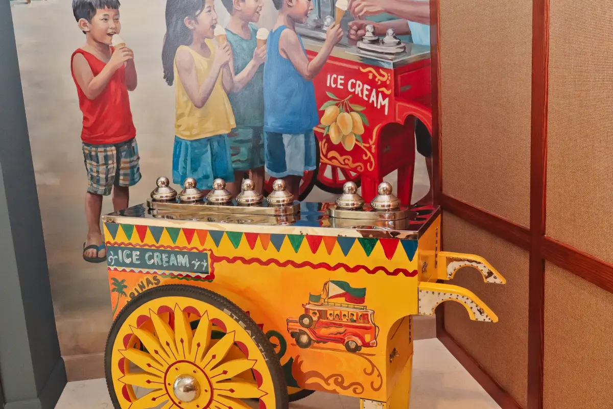 Filipino sorbetero ice cream cart exhibit and mural inside the Angela Duldulao McPherson Museum and Philippine Cultural Arts Center, Port Hueneme CA