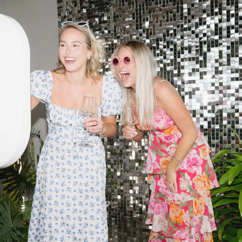 Guests sharing photos at open air social photo booth in LA — Captured Celebrations