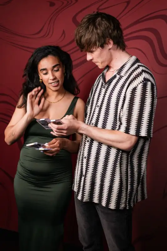 Guests excited about their custom trading cards at Los Angeles event — Captured Celebrations photo booth