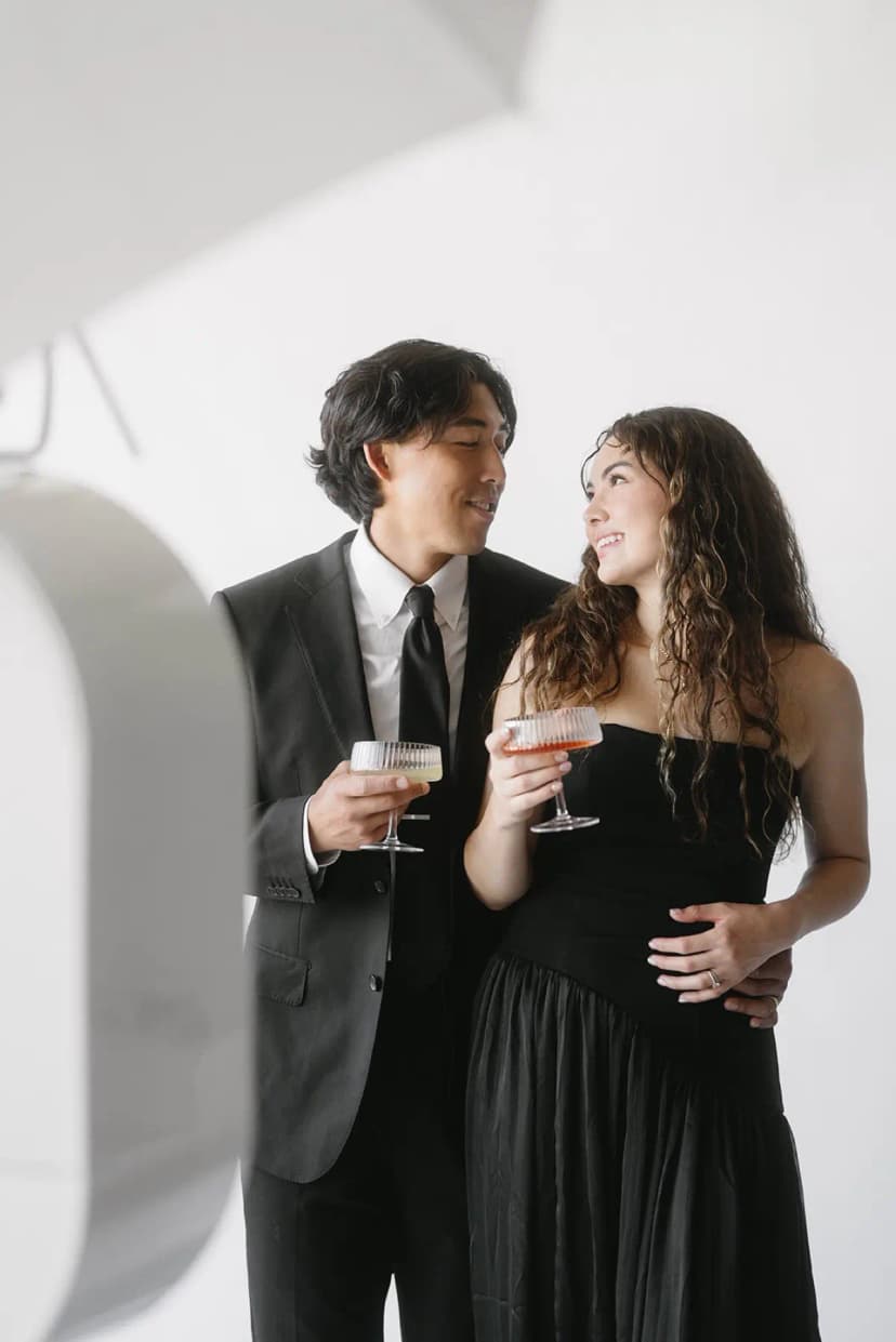 Color glam photo booth portrait of a couple under professional studio lighting in Los Angeles