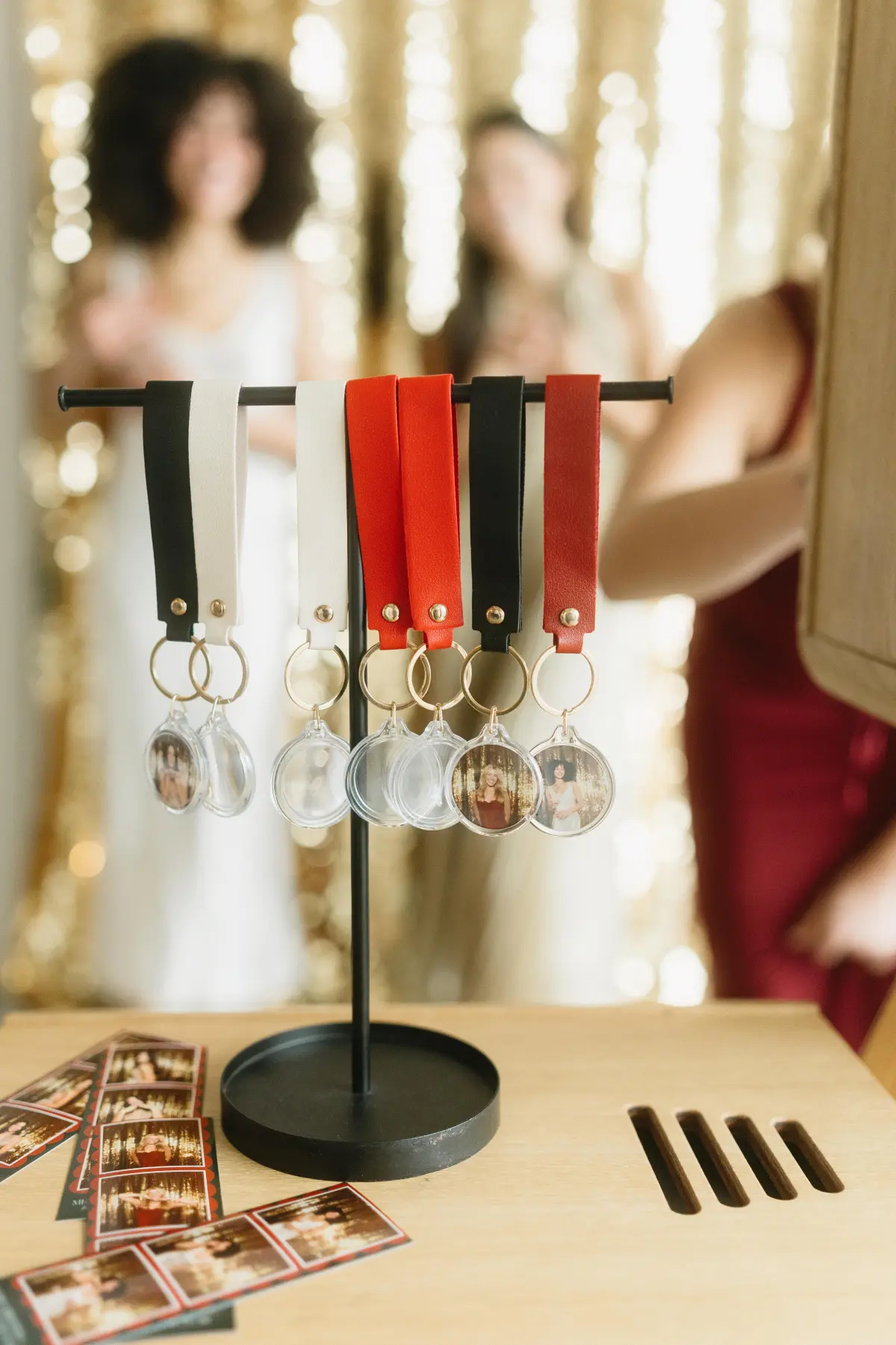 Guests choosing photo keychains at a Los Angeles event