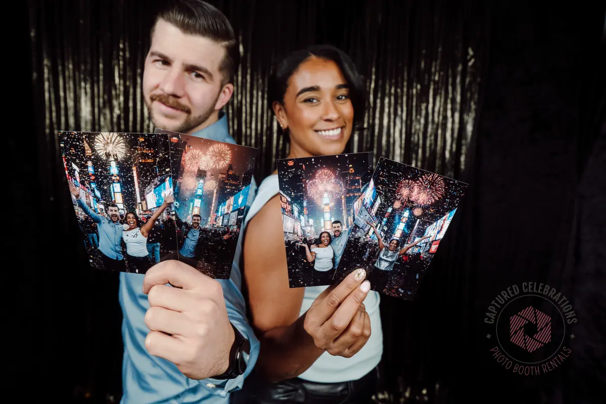 Guests holding AI photo booth prints at a Los Angeles event