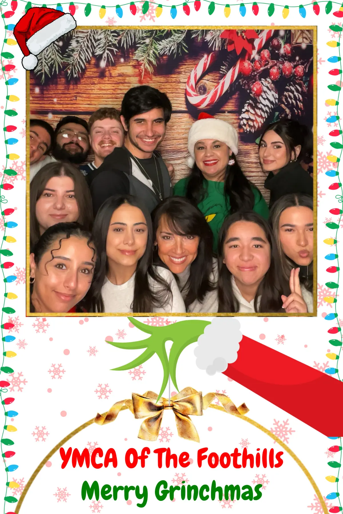 YMCA of the Foothills holiday party photo booth with festive props in La Ca\u00f1ada