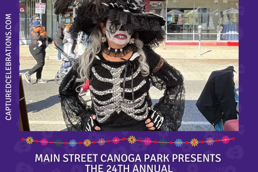 Themed props and floral backdrop at Los Angeles Dia de los Muertos photo booth