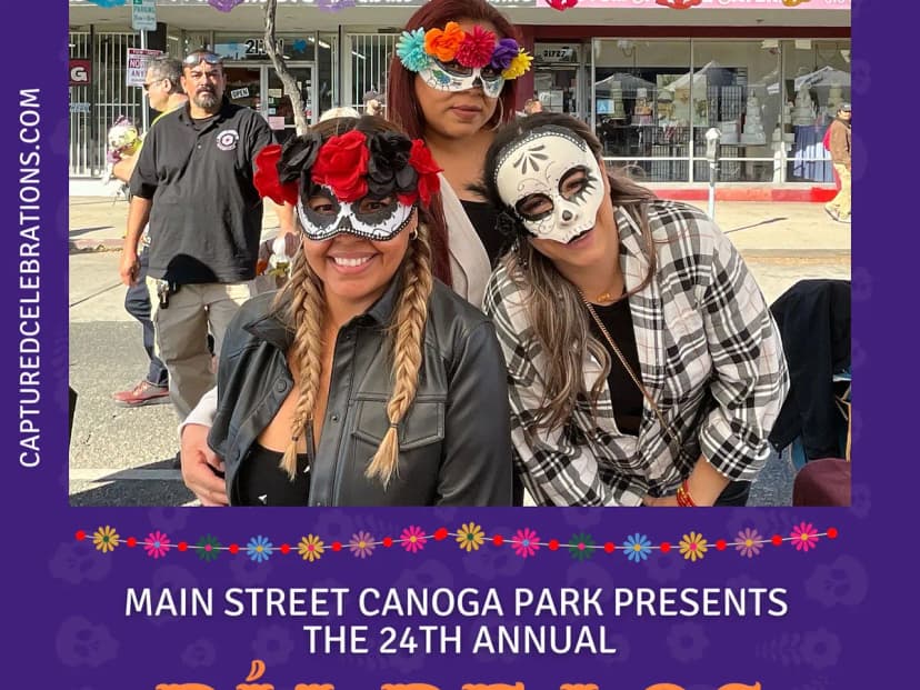 Multigenerational celebration at Canoga Park Dia de los Muertos festival Los Angeles