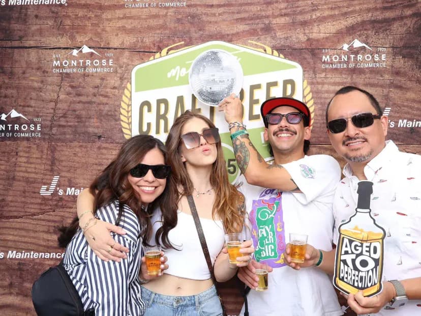 Community members at Captured Celebrations photo booth at Montrose Craft Beer Fest 2026