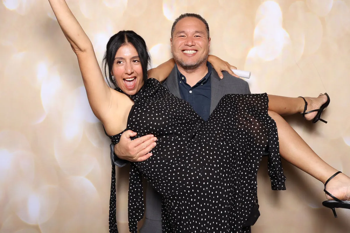 Guests enjoying the Captured Celebrations photo booth at the Wish Upon a Wedding ceremony, Hart & Maine Events, Santa Clarita, Los Angeles County