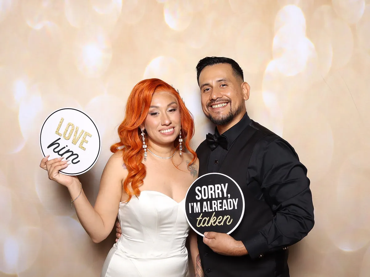 Guests posing at photo booth during Wish Upon a Wedding ceremony near Los Angeles