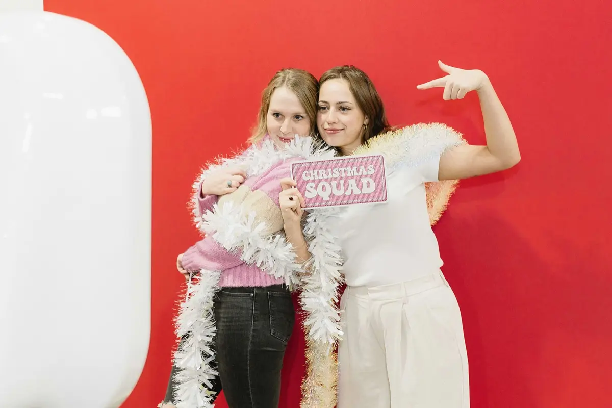 Christmas candy theme photo booth with holiday decorations