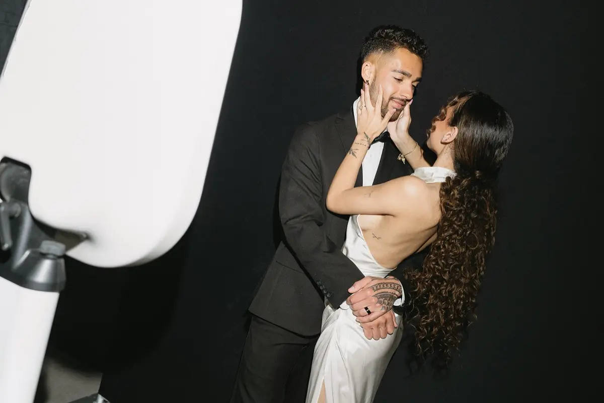 Late night open air photo booth rental with wedding guests