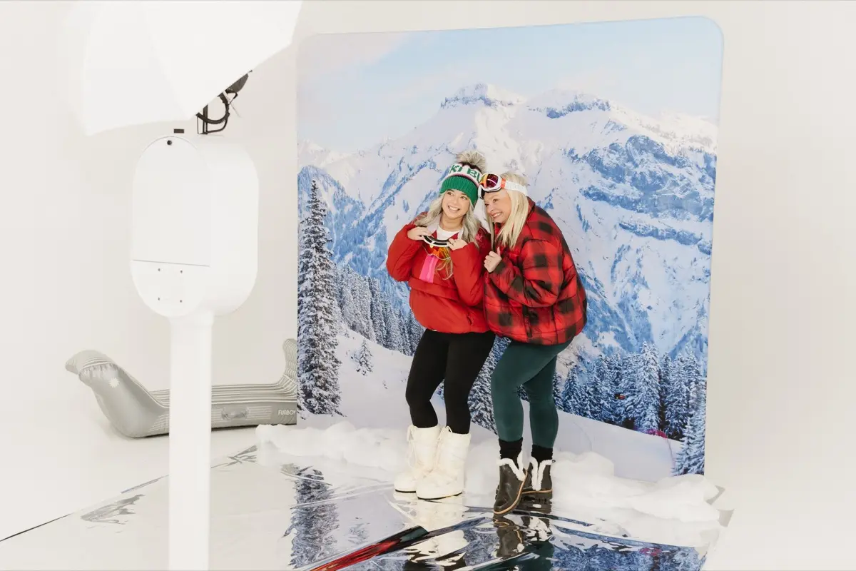 Winter apres ski themed photo booth at a corporate networking event